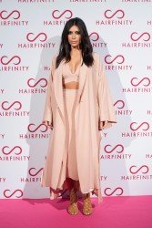 Kim & Khloe Kardashian @ Hairfinity UK Launch Party in London (November 8, 2014)